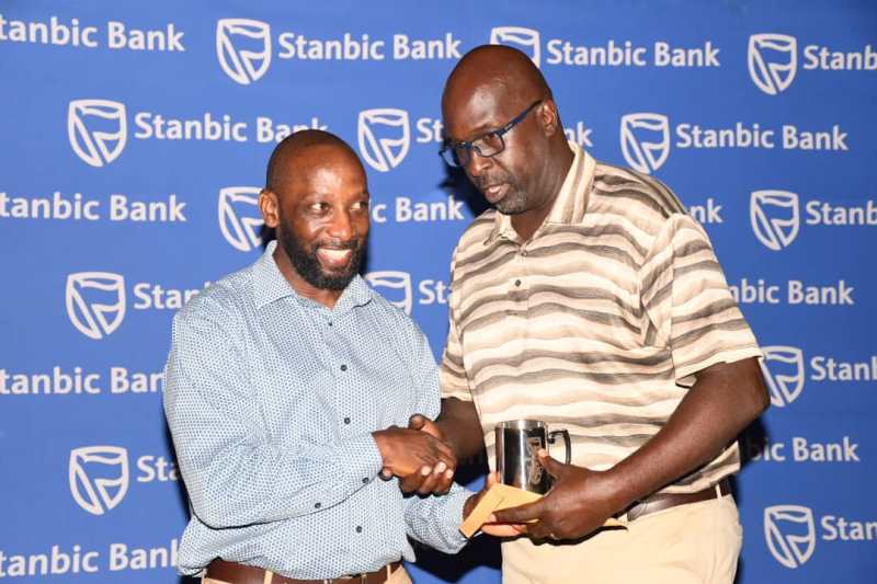 Drani Bob, the overall winner of the Stanbic Monthly Mug Challenge at the Uganda Golf Club in Kitante, Kampala