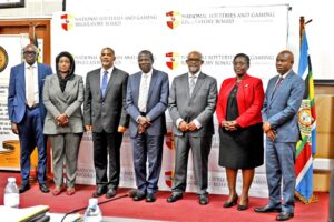Minister of Finance Ho. Matia Kasaija with the new board for National Lotteries and Gaming Regulatory Board