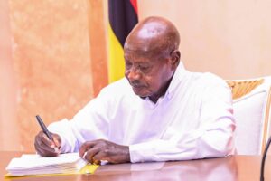 President Museveni signs the Sugar cane bill