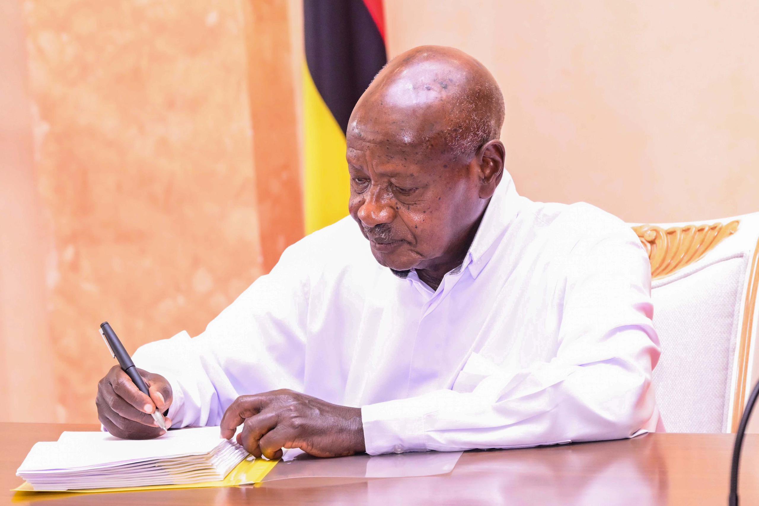 President Museveni signs the Sugar cane bill